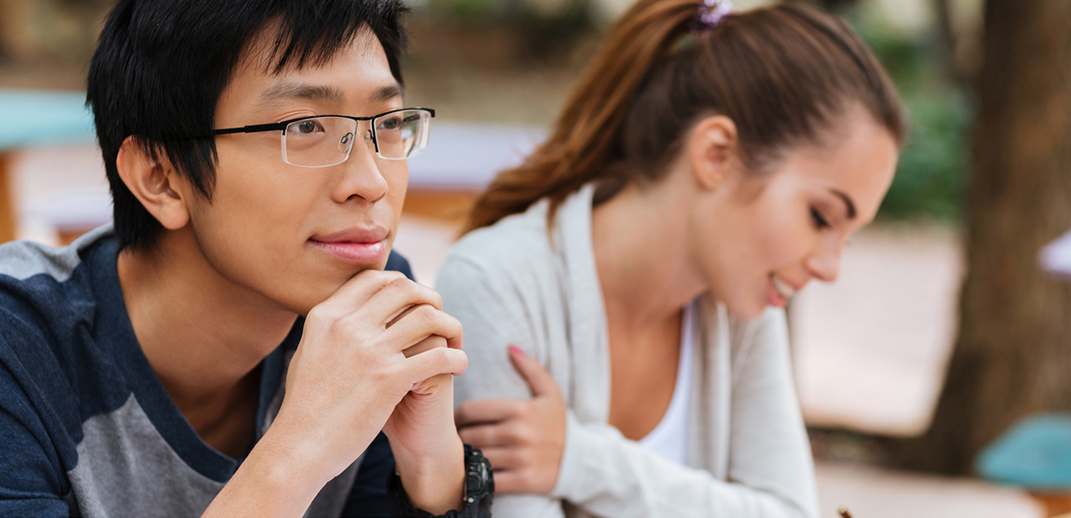 happy-young-couple-listening-and-writing-on-the-lesson-together